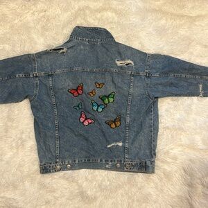 Embroidered blue jean jacket heavy duty 100% cotton. Stressed Size 16